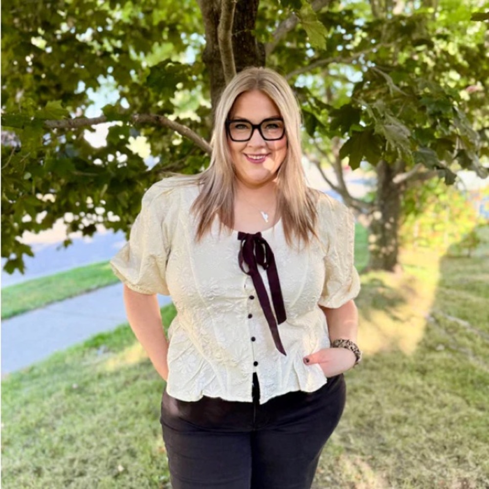 Chic Cream Blouse with Black Ribbon Detail